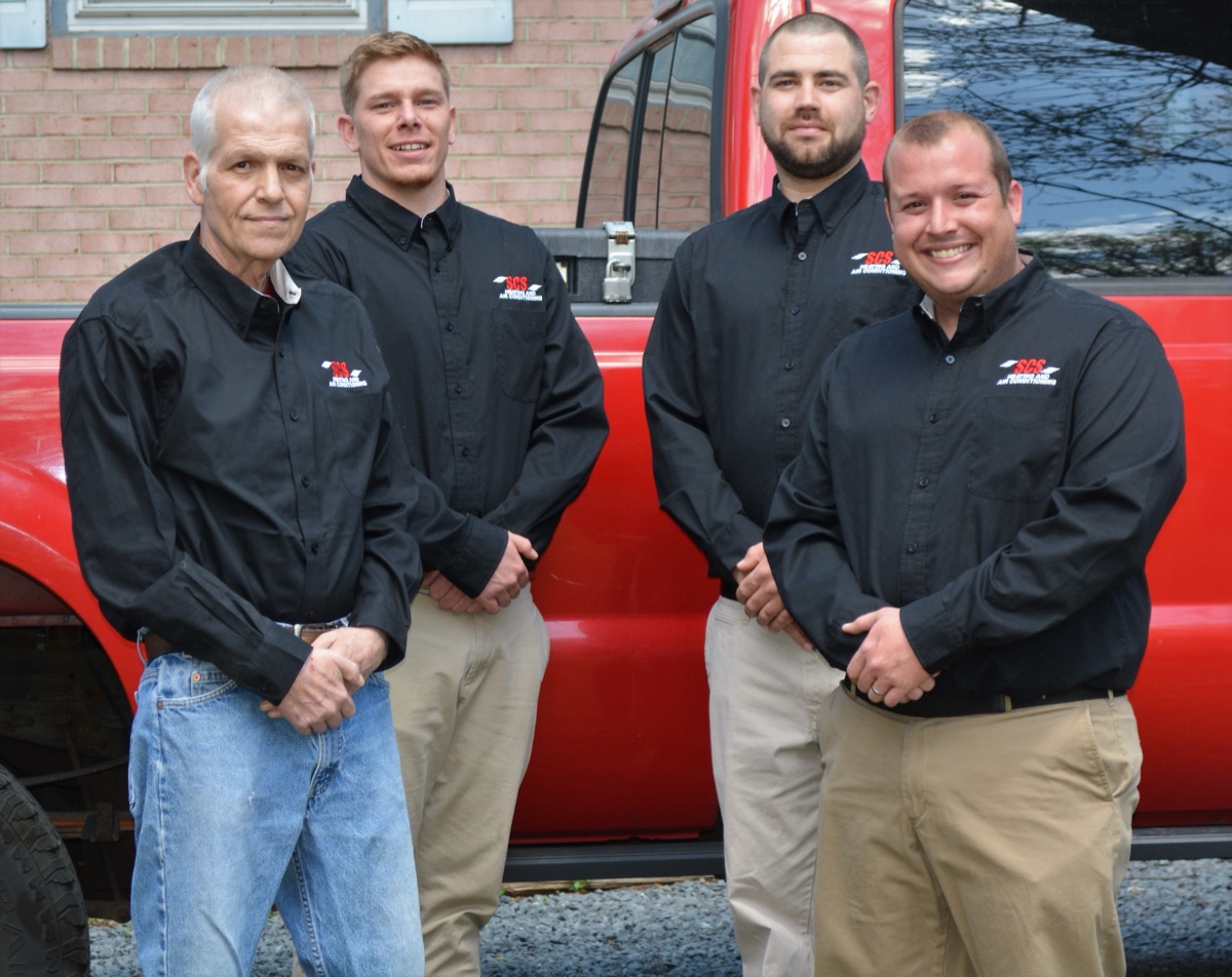 The SCS family team on a job site